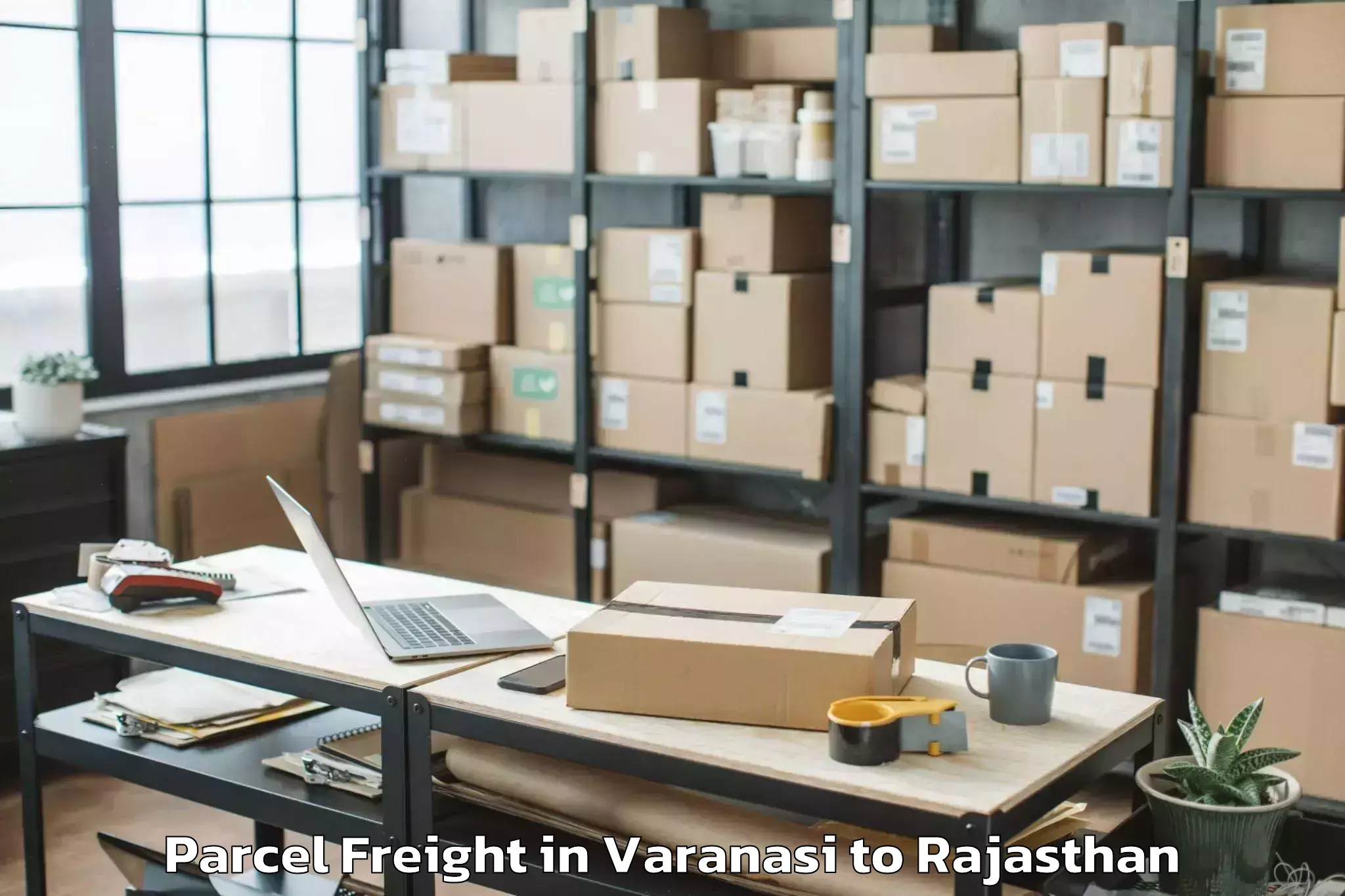 Top Varanasi to Khajuwala Parcel Freight Available